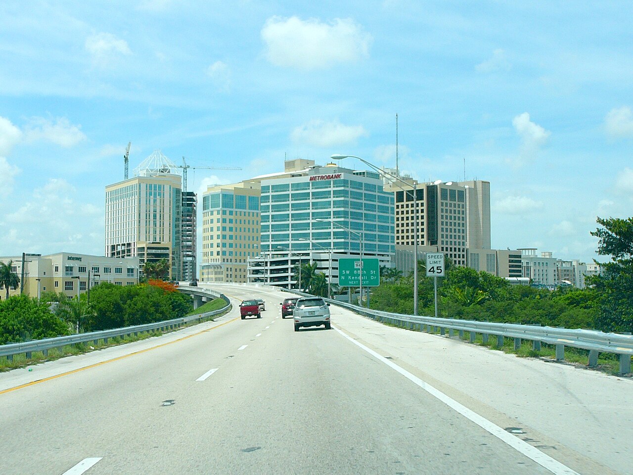 Miami skyline with several prominent office towers, reflecting corporate growth